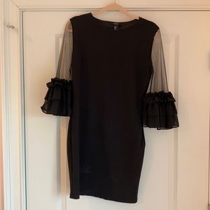 Black ruffled sheer sleeve little black dress